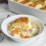 The lazy man version of chicken pot pie is still 100% from scratch but easier and even more delicious than a traditional chicken pot pie! The best and most perfect biscuit recipe included. acupofcream.com