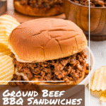 a close-up shot of a barbecue ground beef sandwich on a white plate with ridged potato chips on the side.